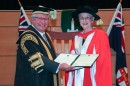 Chancellor The Hon Michael Egan AO presents The Hon Catherine Branson QC with her honorary doctorate. Credit: Dermot Walsh