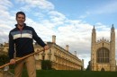 Matthew Samson engaging in the iconic Cambridge pass time of punting, in front of the University of Cambridge