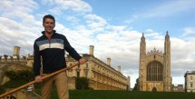 Matthew Samson engaging in the iconic Cambridge pass time of punting, in front of the University of Cambridge