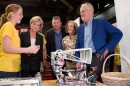 Macquarie-based Team 3132 Thunder Down Under team member Kathryn Allen explains the team's robot to Foreign Minister The Hon Julie Bishop, Member for Reid The Hon Craig Laundy MP, Lucy Turnbull AO, and Prime Minister Malcolm Turnbull at the 2016 FIRST Robotics competition.