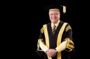 The Hon Michael Egan, AO Chanellor in academic dress