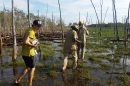 PhD student Daniel Sloane in the field with Yirralka Rangers on North East Arnhem Land floodplains