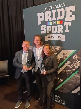 Macquarie University staff Pete Boyle, Brett Morley and Sophie Curtis at the Pride in Sport awards ceremony.